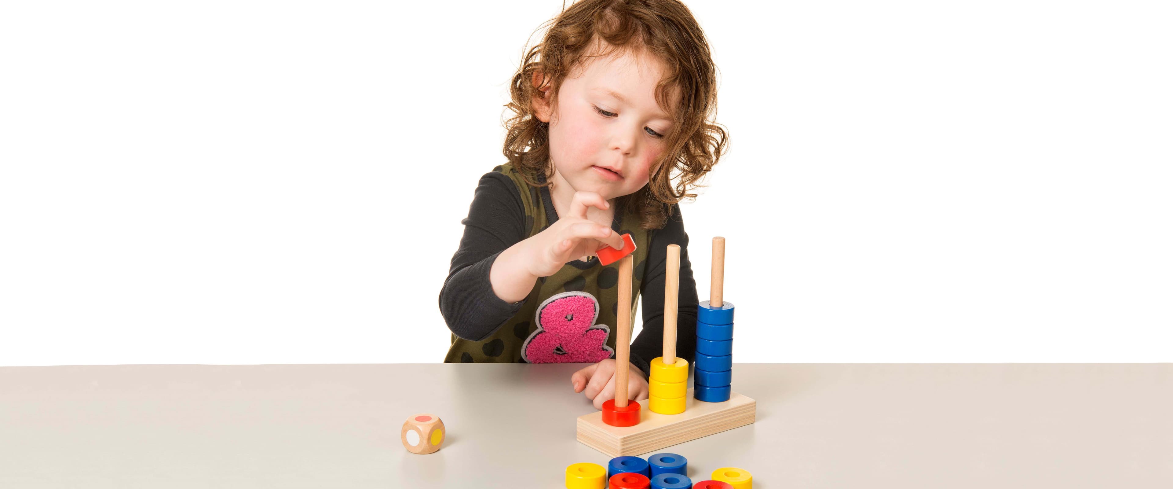 Gril with a wooden toys for life material