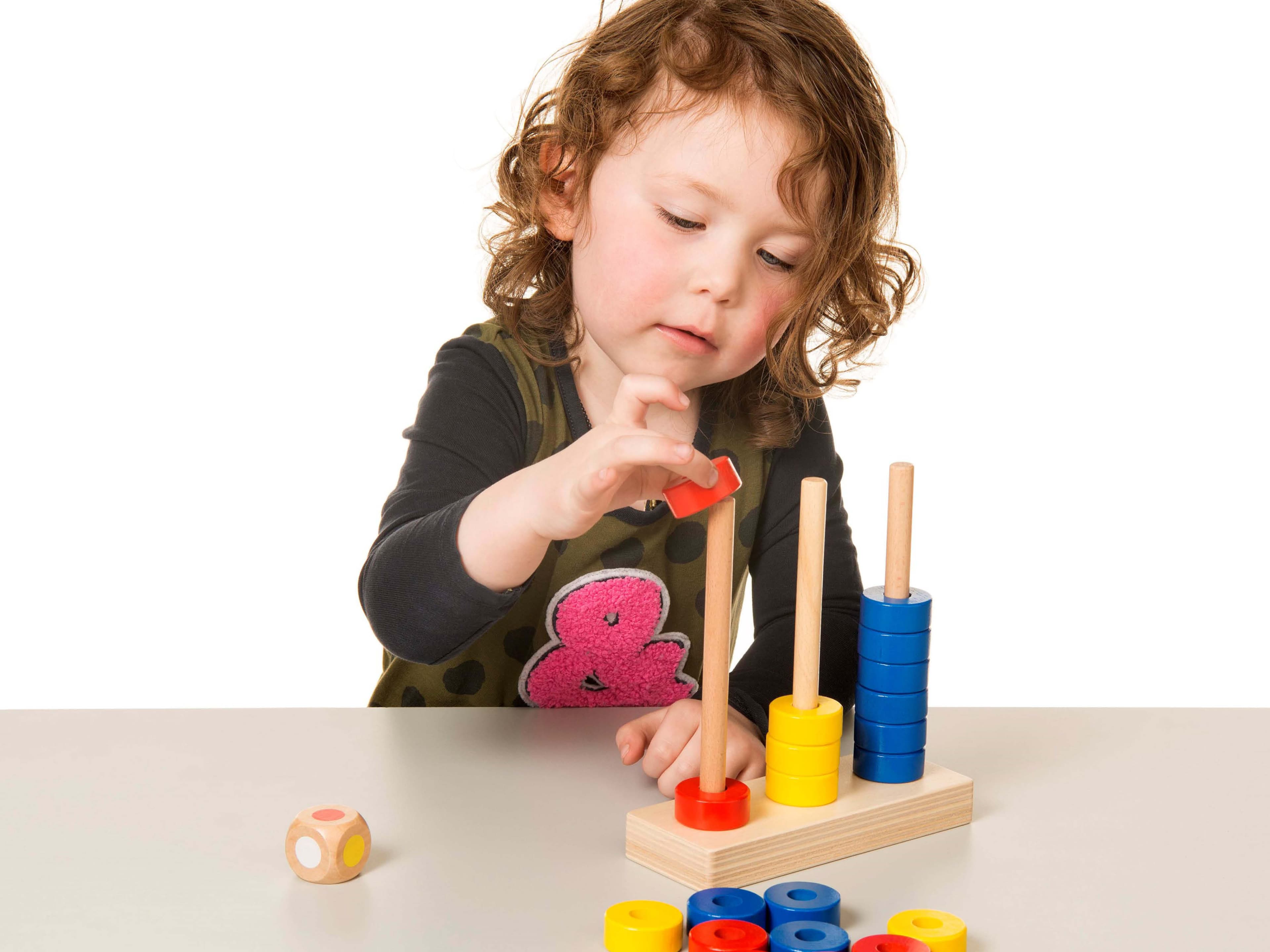 Gril with a wooden toys for life material